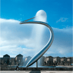 Sculpture with a sphere of water at the upper end