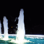 Archotectural fountain illuminated with LEDs, with several cascade jet nozzles