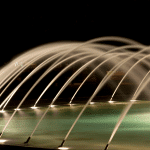 Architectural fountain with parabolic jets            