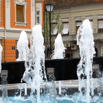 Architectural fountain composed of snow jets            