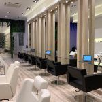 A water wall inside a retail space used as a decorative feature